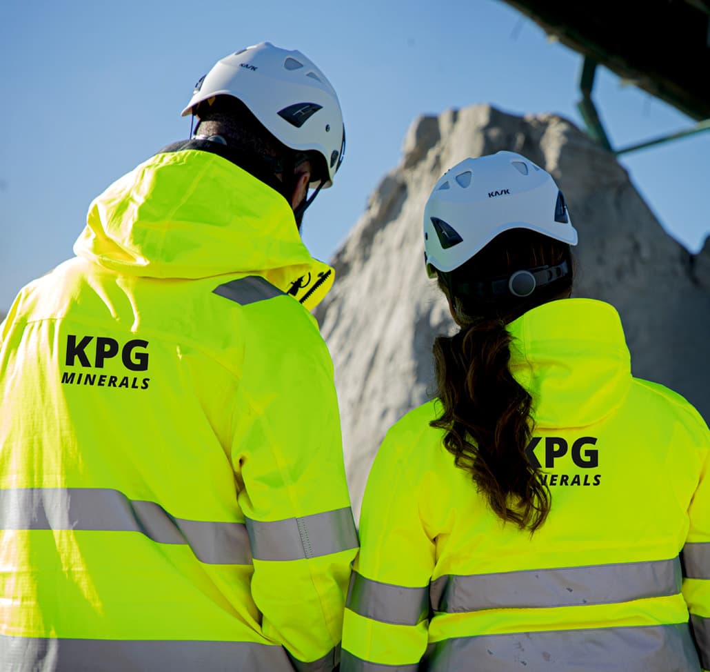 Equipo con chaquetas de alta visibilidad